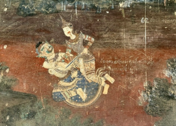 Traditional Khmer mural at the Silver Pagoda showing Preah Leak, dressed as a royal prince, stabbing the ogress Surpanakha as she falls backward, set against a dark red background with traces of Khmer script and landscape details.