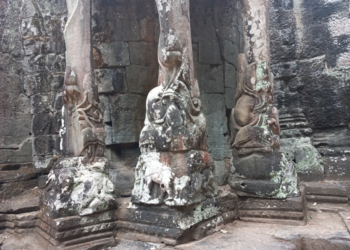 Weathered elephant trunk carvings at the inner side of Victory Gate in Angkor Thom, Siem Reap, showing ancient Khmer stone detail and texture