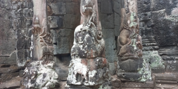 Weathered elephant trunk carvings at the inner side of Victory Gate in Angkor Thom, Siem Reap, showing ancient Khmer stone detail and texture