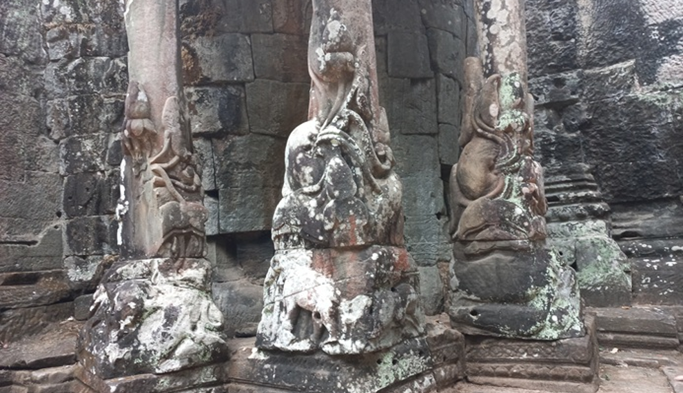 Weathered elephant trunk carvings at the inner side of Victory Gate in Angkor Thom, Siem Reap, showing ancient Khmer stone detail and texture