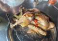 Traditional roasted chicken served at Phnom Chisor, Cambodia, prepared from naturally fed free-range chickens with herbs and local seasonings.