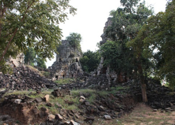 Ancient sandstone towers and forest-covered ruins of Banteay Toap temple in Banteay Meanchey Province, Cambodia
