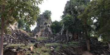 Ancient sandstone towers and forest-covered ruins of Banteay Toap temple in Banteay Meanchey Province, Cambodia