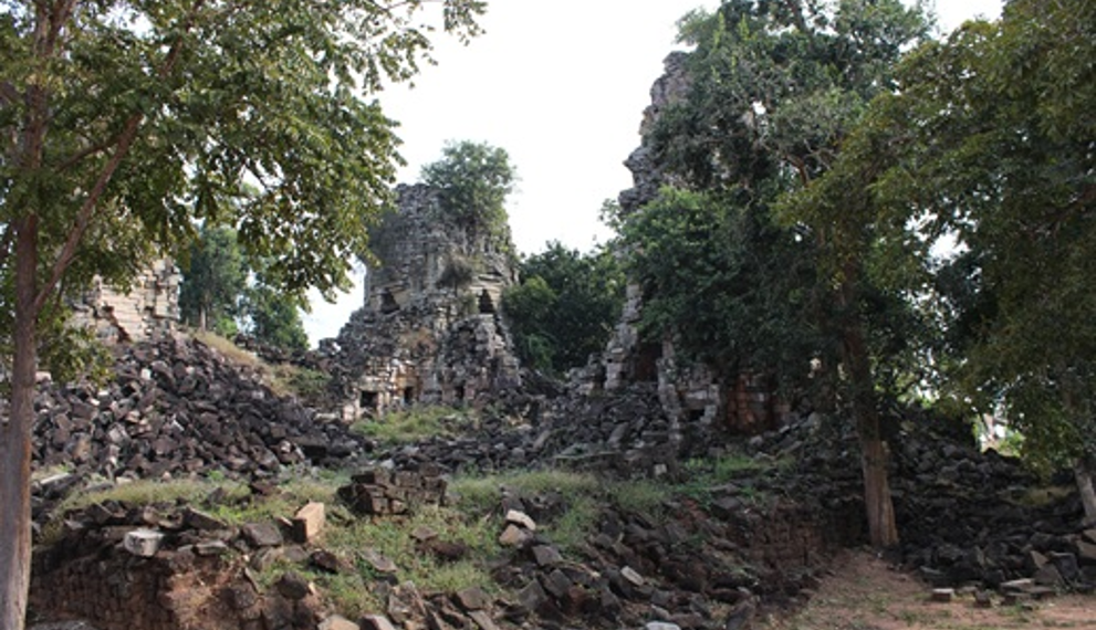 Ancient sandstone towers and forest-covered ruins of Banteay Toap temple in Banteay Meanchey Province, Cambodia