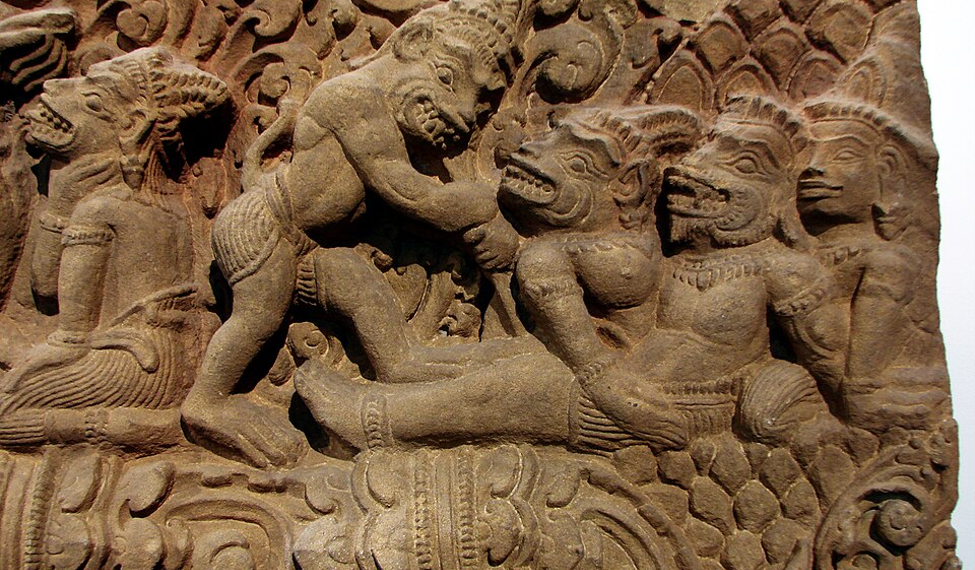 Khmer-style stone relief depicting the death of Valin, with the monkey king surrounded by other figures in a dramatic battle scene.