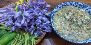 Cambodian shrimp dipping sauce, ទឹកគ្រឿងបង្គា, served with fresh herbs and vegetables