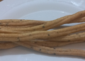 នំង្កឹះ Khmer chopstick bread arranged on a white plate