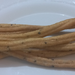 នំង្កឹះ Khmer chopstick bread arranged on a white plate
